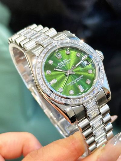 Rolex Datejust 31mm Osytersteel Bracelet Olive Green Dial Lady Baguette Watch